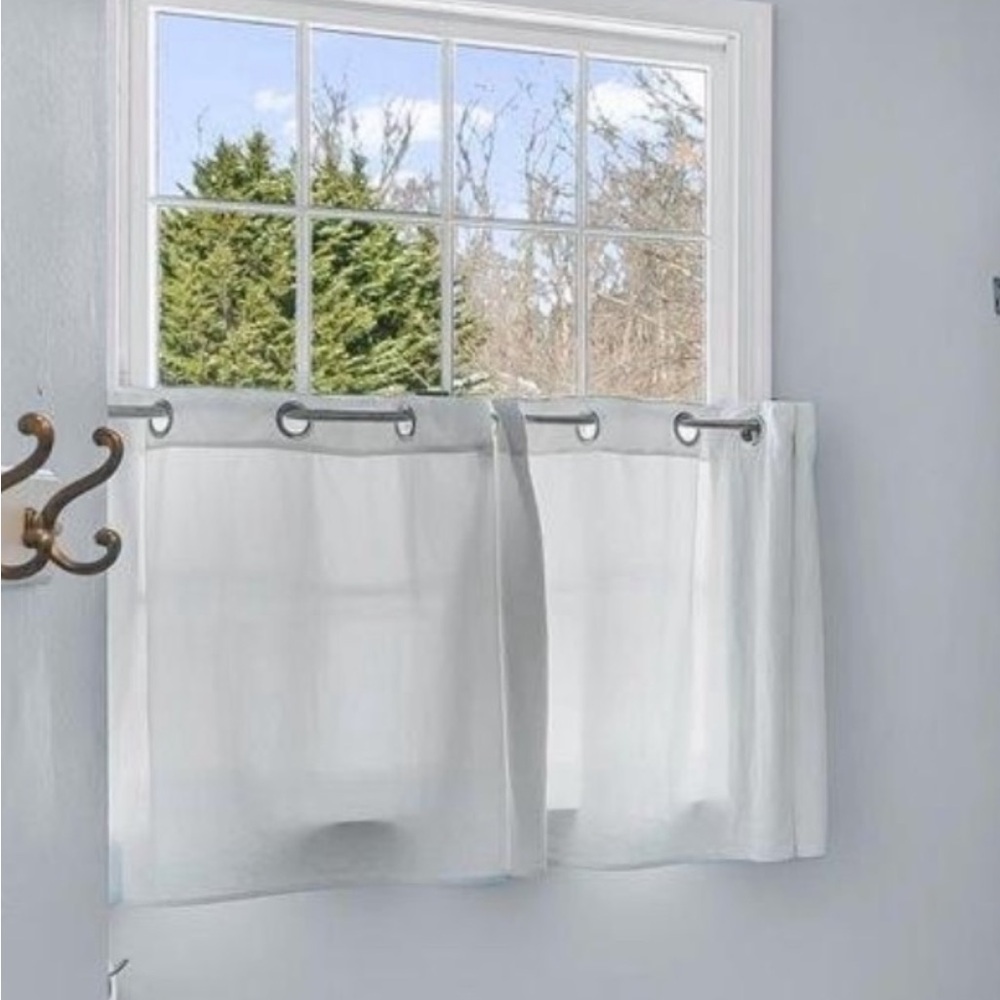 2 IKEA MERETE ivory grommet curtain panels